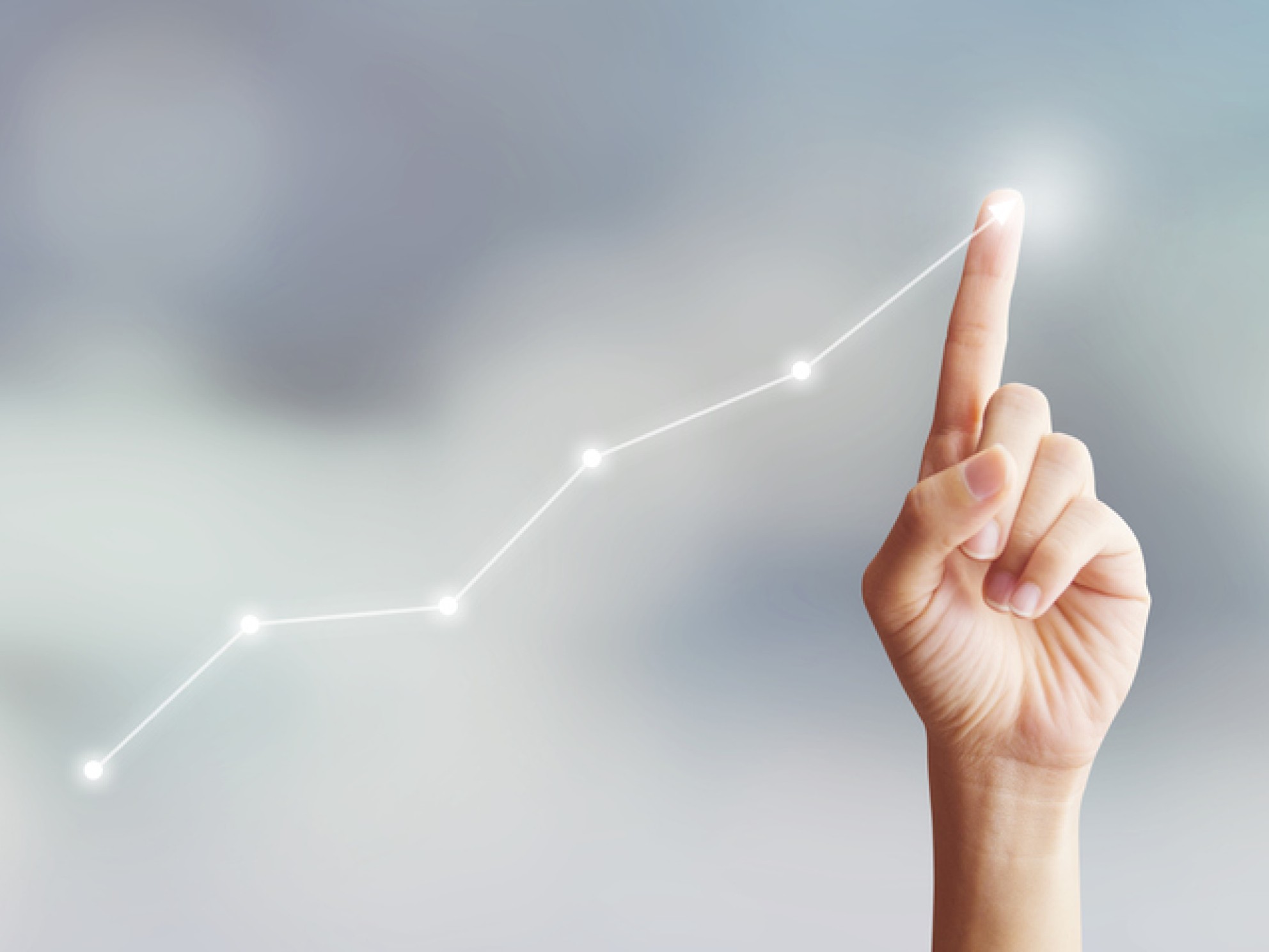 Hand touching graph moving up with plan growing